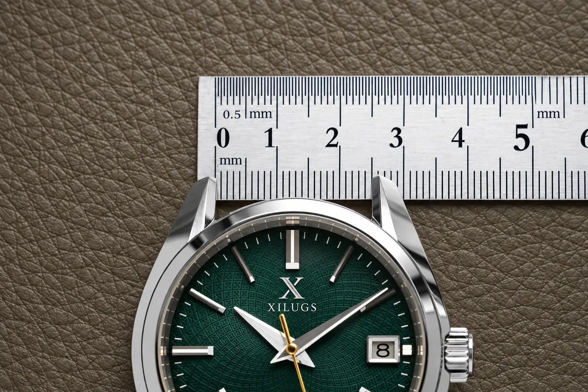 A steel ruler laid flat across the lugs of a watch, lined up to read the gap from the inner edge of one lug to the inner edge of the other.